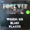 WORDS ON BLACK PLASTIC